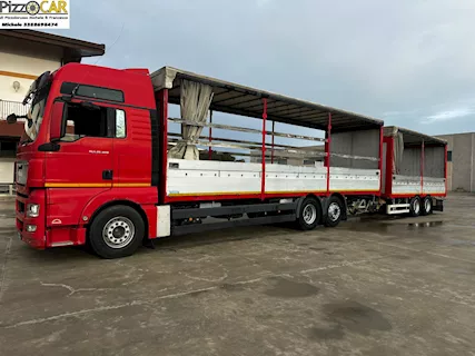 Man TGX 26.480 centinato 9,20 e rimorchio biga